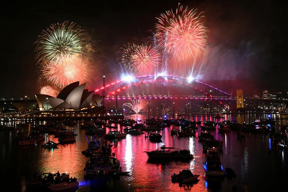 Fireworks light up the midnight sky over Sydney Harbour Bridge and Sydney Opera House during New Year&rsquo;s Day celebrations in Sydney on January 1, 2026. (AFP)