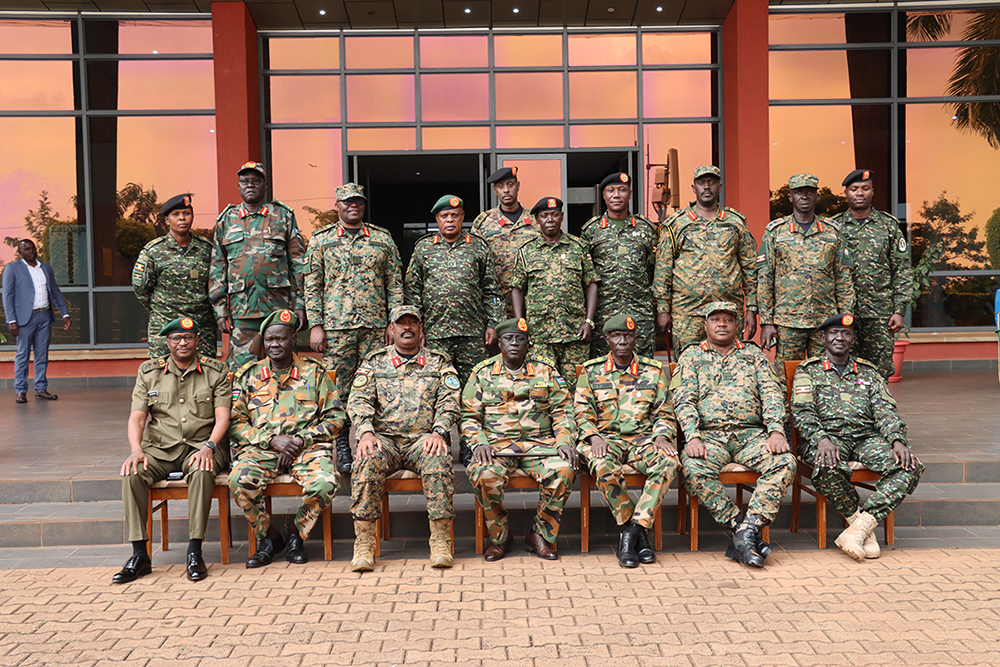 SSPDF Chief of Defence Forces, Gen. Dau Aturjong Nyuol (C),UPDF Commander Land Forces, Lt Gen. Kayanja Muhanga (2 Left), in a group photo with UPDF officials and SSDF delegation. 