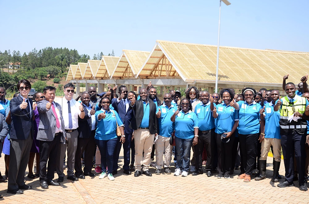   Officials from the Ministry of Water and Environment and those from the Korean embassy pose for a group picture during the commissioning of the Busukuma Faecal Sludge treatment facility in Busukuma division, Nansana municipality, Wakiso district on August 27, 2026. (Credit: Lawrence Mulondo)