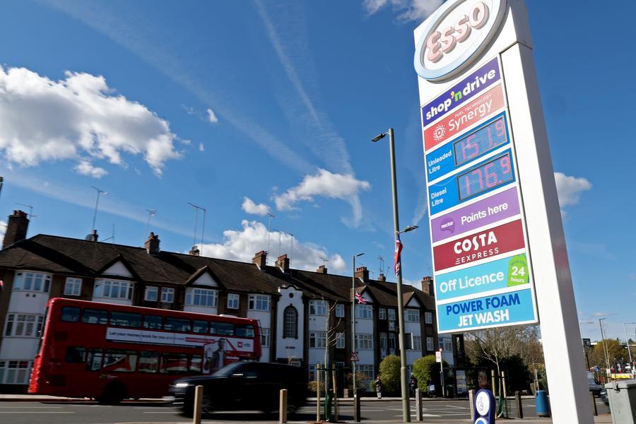 Gas prices are displayed at a petrol station in London, Britain, March 26, 2026. The strikes launched by the United States and Israel against Iran have triggered a sharp spike in global oil prices. (Xinhua/Li Ying)