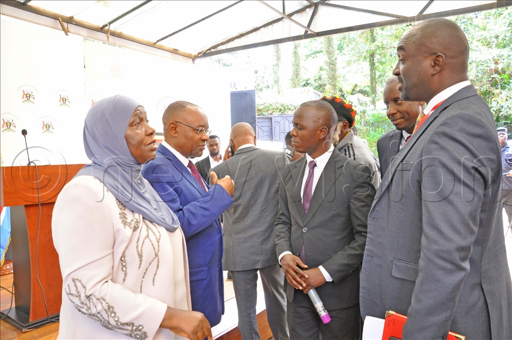 (L-R) Minsa Kabanda Minister for Kampala, Raphael Magyezi Minister of local government,David Sserumagga, Charles Magumba Commissioner Urban Administration and Daniel Nuwabiine Spokesperson KCCA interacting after a press conference at the Uganda Media Centre on April 28, 2026. 