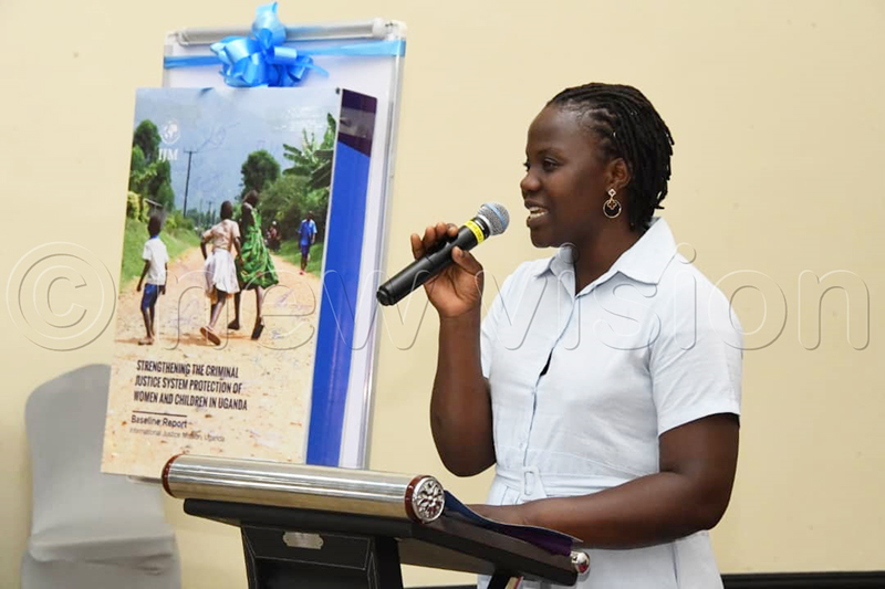 Sawiya Lakareber of Global Survivors Network sharing her story during the launch of the report. (Photo by Mpalanyi Ssentongo)
