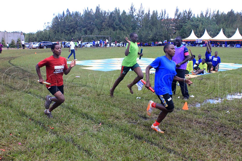  Female students compete in a short relay during the Seeta High School A Campus inter-house sports competition on Monday. (Photo by Henry Nsubuga)