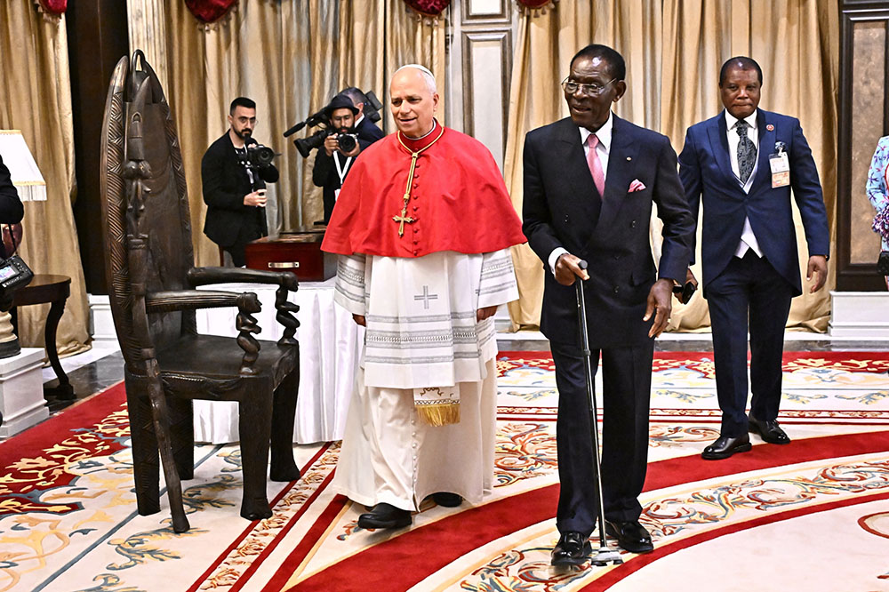 Pope Leo XIV (CL) meets with Equatorial Guinea's President Teodoro Obiang Nguema Mbasogo (CR) at the Presidential Palace in Malabo on the ninth day of an 11-day apostolic journey to Africa, on April 21, 2026. (Credit: AFP)