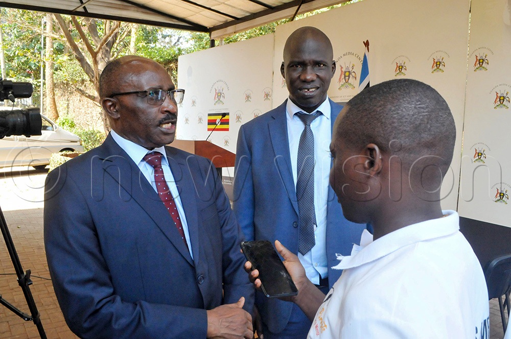 Simon Mulongo (left), the Minister of State for Labour, Employment and Industrial Relations addressing the Media on interventions to end Child Labour in Uganda as Apollo Onzoma, the Assistant Labour Commissioner, Ministry of Gender looks on at the Uganda Media Centre on June 11, 2026. (Photo by Nicholas Oneal)
