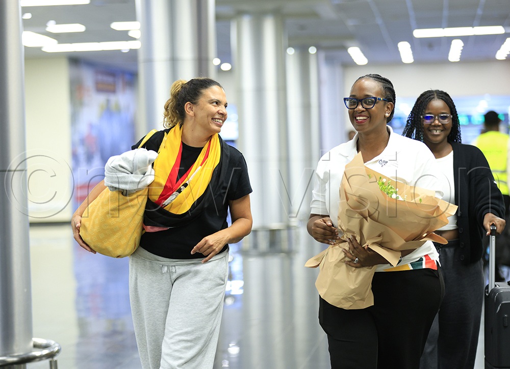 Jacqueline Nanteza (right), founder of ADCCE, welcomes Mannot Estelle Maeva from France at Entebbe International Airport ahead of the conference and familiarisation trips across Uganda. (Credit: Julius Luwemba)