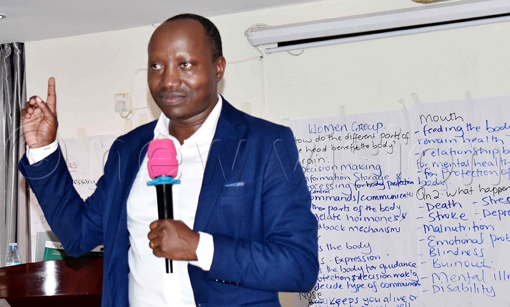 Dr. Godfrey Siu, a Senior Lecturer at Makerere University and also Director CHDC during a training session at Esella Country Hotel. (Photo by Violet Nabatanzi)