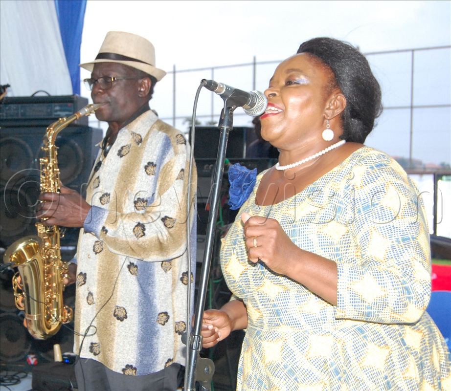 Afrigo Band musicians Moses Matovu and Joanita Kawalya in a cabaret entertainment action during the reception at Hill Side Primary School Naalya.