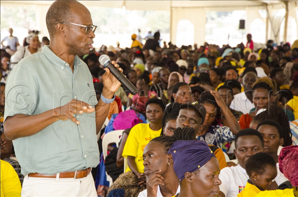 Moses Byaruhanga, Senior Presidential Advisor In-charge of Political Mobilization addressing vendors.