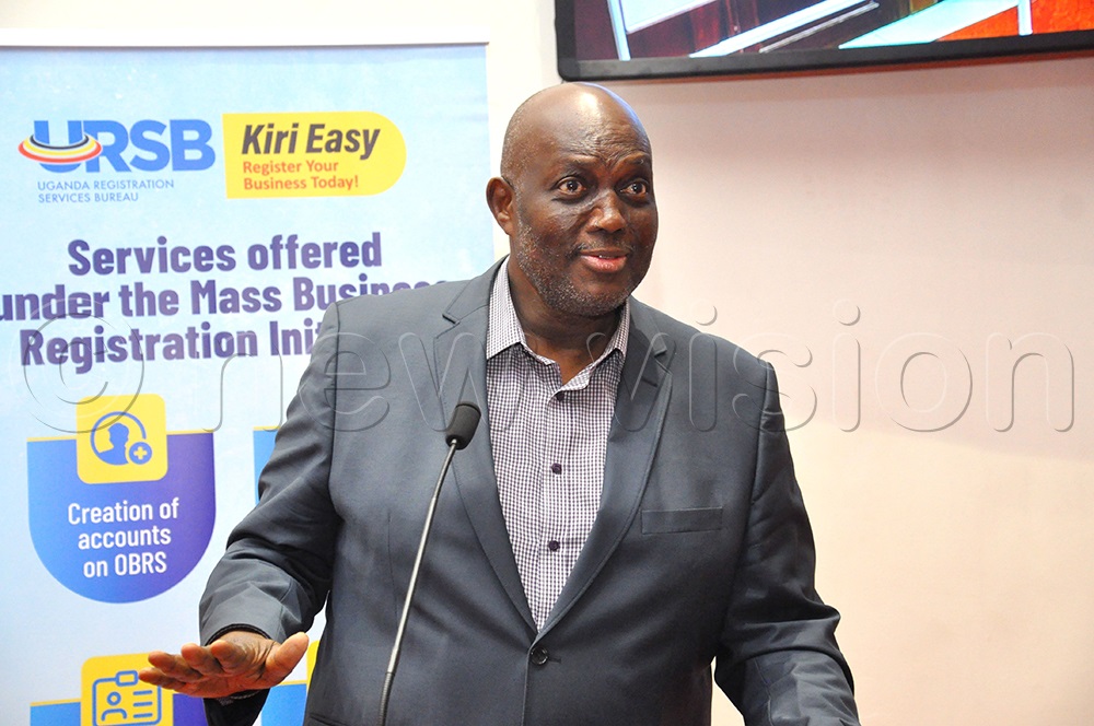 James Bulenzibuto, the Chief Executive Officer Elimu Trust Eastern Africa addressing participants during the business rescue and aftercare program meeting at URBS offices Kololo on February 24, 2025. (Photo by Nancy Nanyonga)
