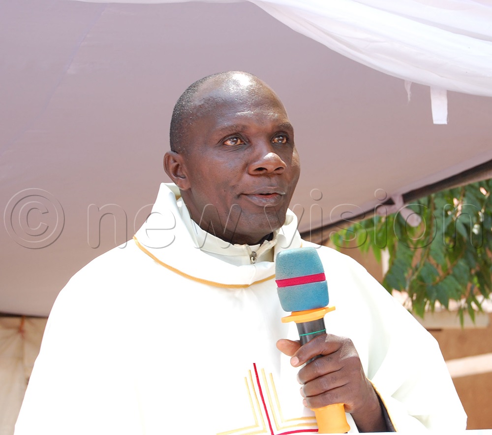 The newly-appointed headteacher of Kisubi-Mapeera SSS, Fr Benedict Kaweesa Munene delivers his thanksgiving remarks. (Photo by Mathias Mazinga)