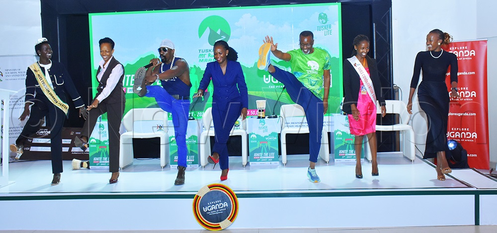 Kick boxer Moses Golola (3rd left) leading drills to encourage fitness for runners intending to participate in the Rwenzori marathon during the activation on Wednesday at Fairway hotel. (Credit: Julius Luwemba)