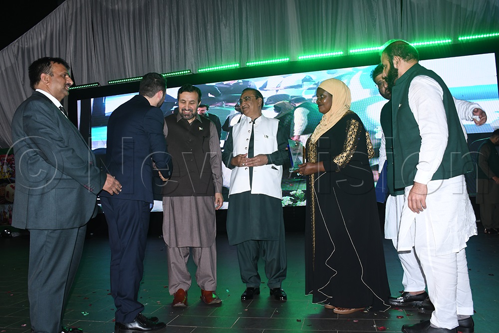 Chief guest 3rd Deputy PM Lukia Nakadama handing over an award to Iran Ambassador in Uganda, Majid Saffar in Uganda during the 78th independence celebration at Kampala Parents on Friday. (Photos by Aloysious Kasoma)