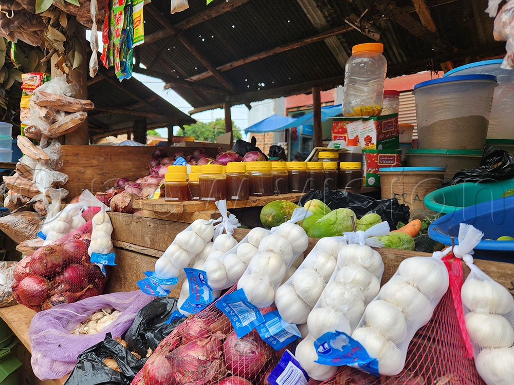 Samples of honey and other vegetables being sold in Seeta Central Market Mukono district. This was on March 3, 2025. (Credit: Lawrence Mulondo)