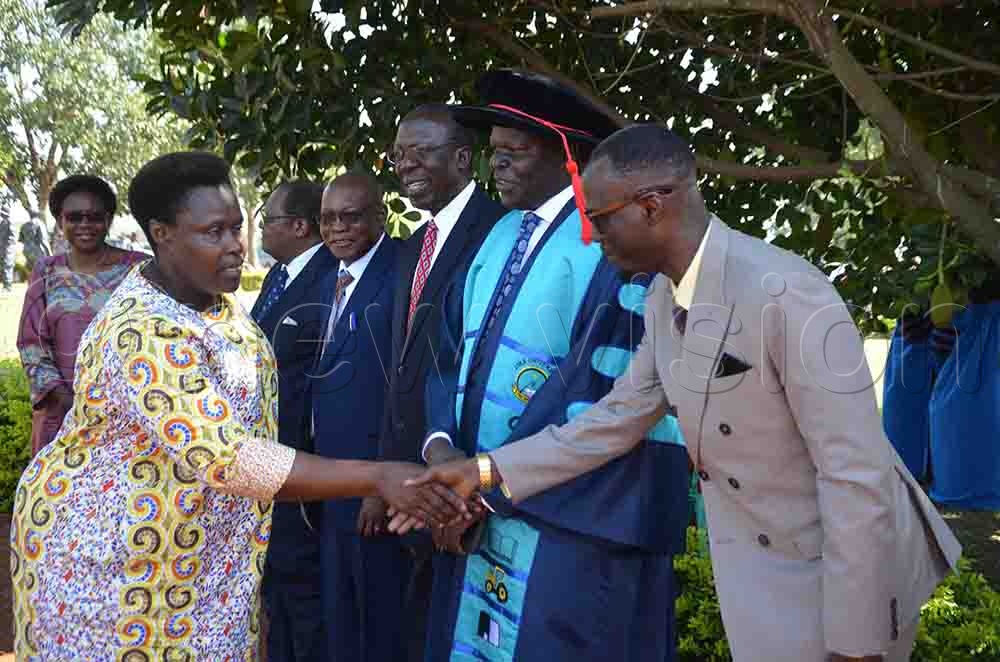 Vice President Alupo being received by Lira University officials, including Lira City RCC Lawrence Egole, before kicking off the graduation ceremony on Friday. (Credit: Patrick Okino)