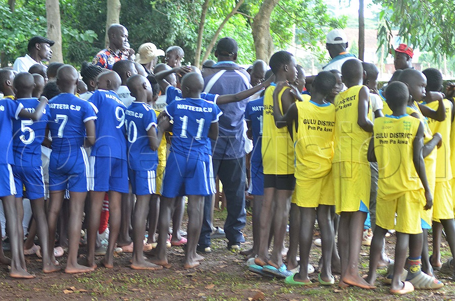 Primary school children being verified a head of the compitition Esiku
