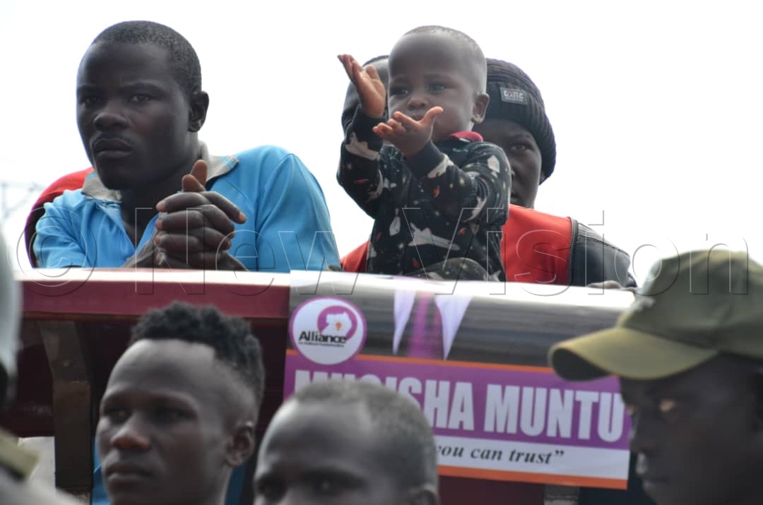 A young child attending Muntu's campaign rally. (Credit: Stuart Yiga)