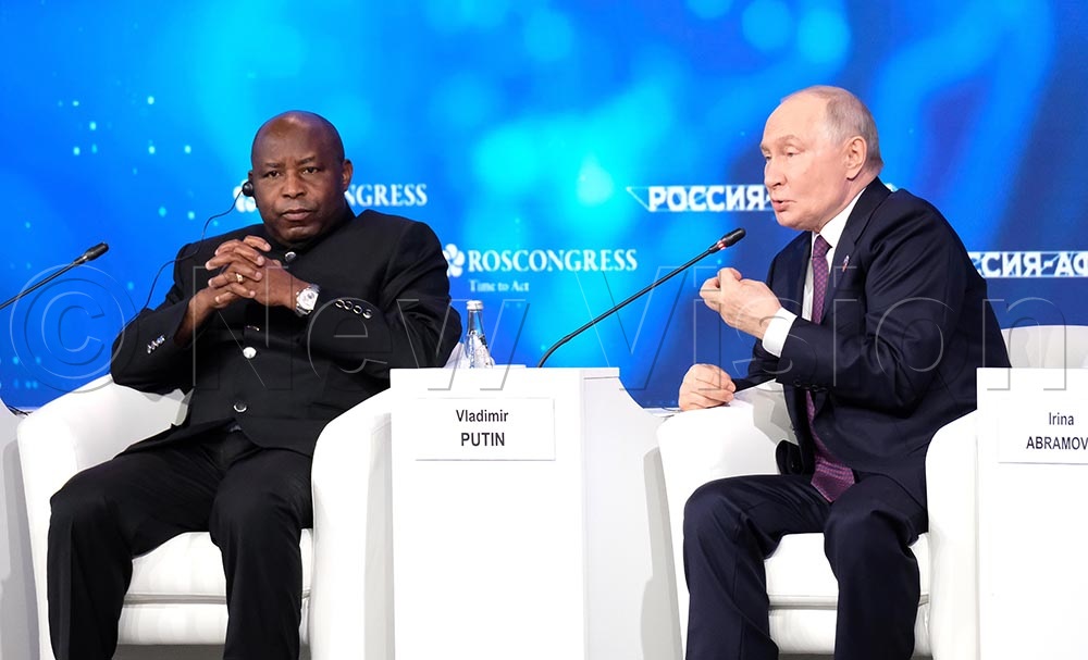 Vladimir Putin, President of Russia speaking as Chairperson of African Union, Evariste Ndayishimiye of Burundi looks on, during the official welcoming ceremony of the Russia - Africa Economic and Humanitarian Forum in Moscow, on October 28 2026.
