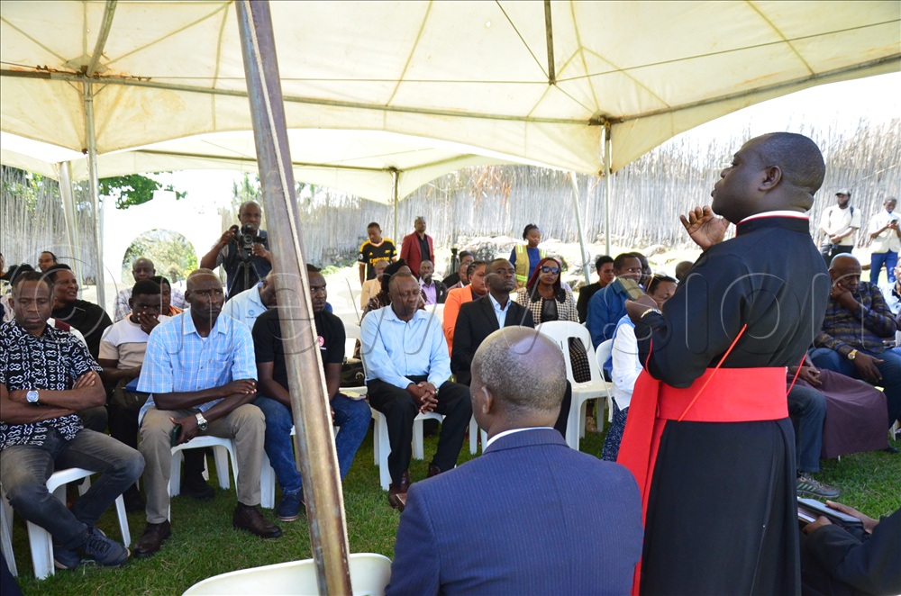 Rev. Robert Abigaba, the dean of St. John's Cathedral, comforting the members of the royal clan and the subjects in the meeting organised at the palace.