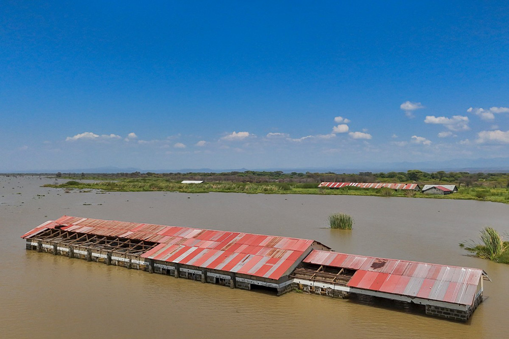 An aerial image shows a block of classrooms completely inundated by the rising Lake Bogoria in Marigat sub-county, Baringo county on July 28, 2026. (Photo by Tony KARUMBA / AFP)