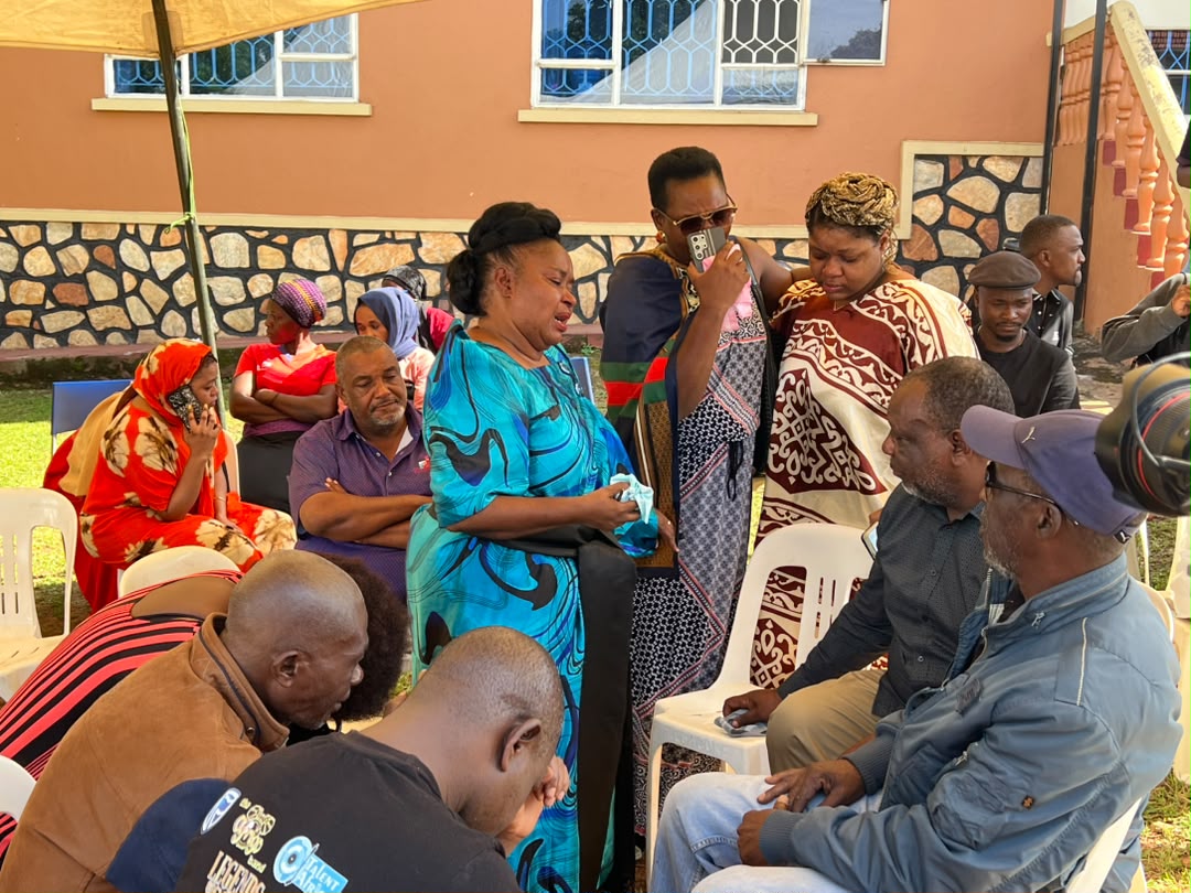 Crest Fallen mourners come to grips with the news of Moses Matovu's passing. 