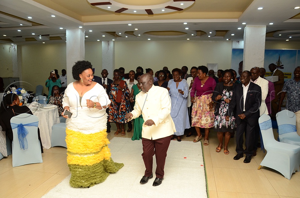 (L-R Front) Lion Catherine Kiiza and Dr. Hilary Kiiza the new President of the Kampala Central Lions Club arriving at the 32nd presidential installation ceremony of the Kampala Central Lions Club with a dance in company of other club members. This was at Hotel Eliana in Kampala on June 21, 2026. (Photo by Lawrence Mulondo)