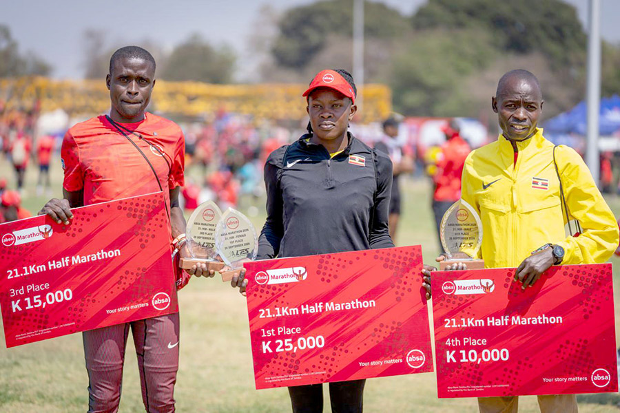 Peter Akwech (left), Sylivia Chelangat and Isaac Masai (right) pose with their awards after the race in Zambia, September 28, 2026. Courtesy photo