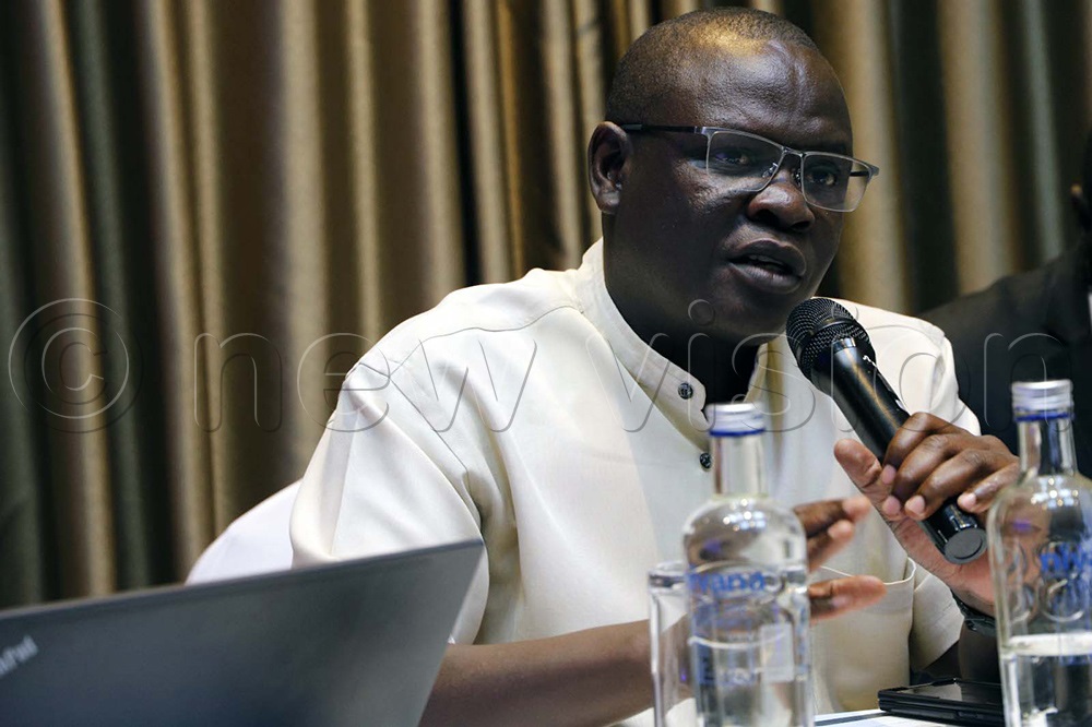 Vincent Kedi, the assistant commissioner licensisng and administration from the department of geological survey and mines addressing participants attending the stakeholder engagement on regulations for the Mining and Minerals Act 2022 at the Sheraton Hotel Kampala. (Photo by John Odyek)