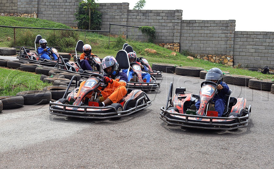 Competitors battle during the fourth round of the National Karting in Lubowa. PHOTO: Johnson Were