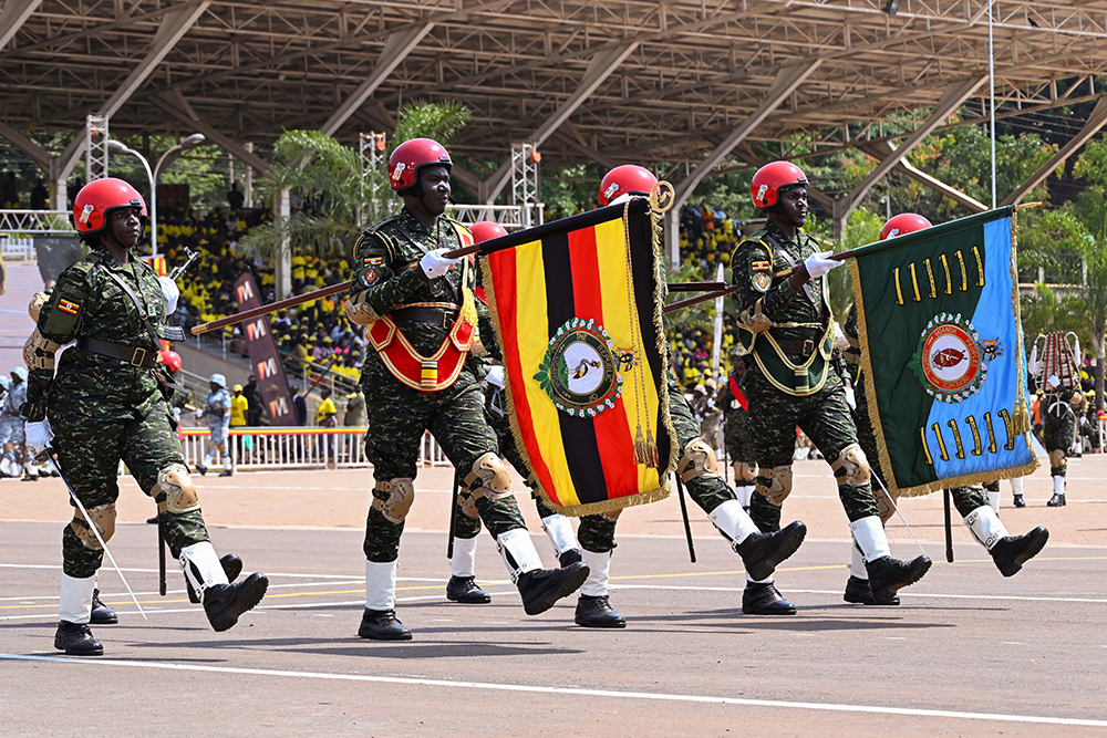 Military officers marching during the NRM Liberation day celebrations at Kololo on Monday. (PPU Photo)