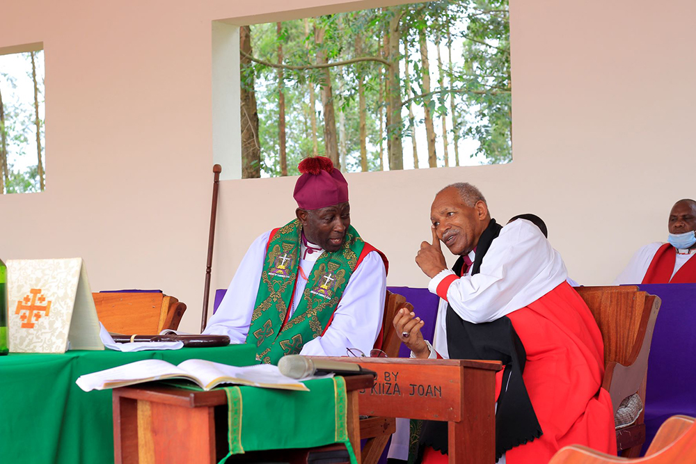 Archbishop of the Church of Uganda, His Grace the Most Rev. Stephen Kaziimba Mugalu (right), shares a moment with Archbishop Emeritus of the Anglican Church of Rwanda, the Rt. Rev. Emmanuel Mbona, during the Abaanabasazi function at BKD Conventions Ground in 2022. (Credit: Peter Abaanabasazi)