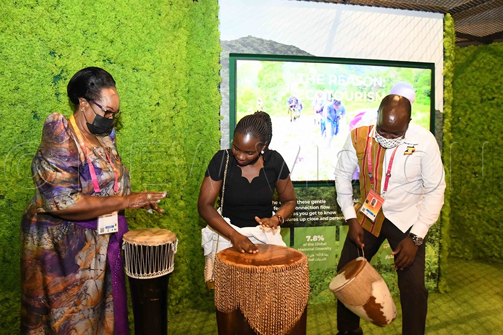 Ssebugwawo drumming at the show