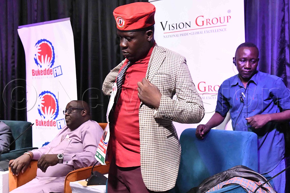 Nsereko drops his jacket and puts on another. (Credit: Eddie Ssejjoba)