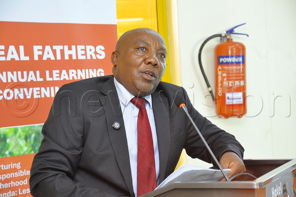 Fred Ngabirano, the Commissioner Youth and Children Affairs at the gender ministry, addressing participants during the Responsible, Engaged and Loving (REAL) Fathers annual learning conference at Hotel Africana in Kampala. (Credit: Nancy Nanyonga)