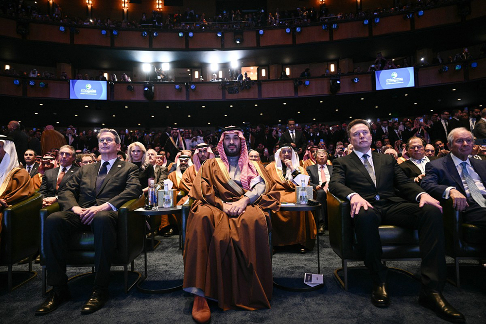 (L-R) US Secretary of Treasury Scott Bassent, Crown Prince and Prime Minister of the Kingdom of Saudi Arabia Mohammed bin Salman and Elon Musk arrive prior US President Donald Trump delivering remarks at the US-Saudi Investment Forum at the John F. Kennedy Center for the Performing Arts in Washington, DC on November 19, 2025. 