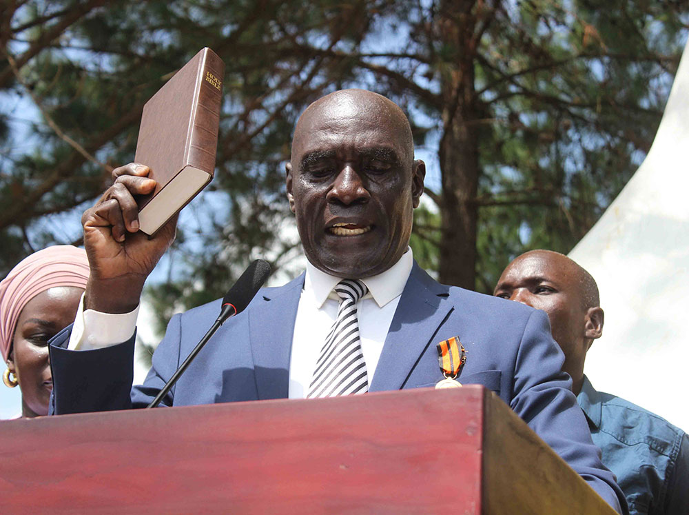 Albert Anthony Ejoku being sworn in as the LC5 chairperson of Kaberamaido. (Credit: Michael Onyinge)