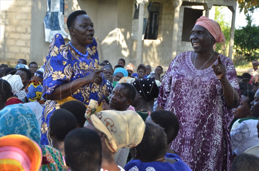 Elizabeth Ebasu, the Mothers Union president in the Anglican Diocese of Soroti (left) speaking to women during the conference in Katakwi district on Wednesday.