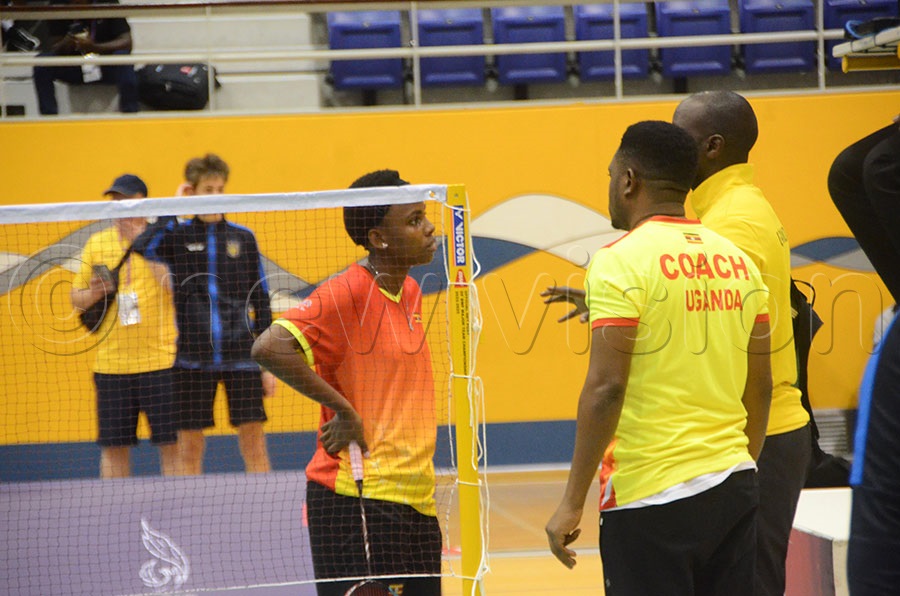 Uganda table tennis coach Richard Muguluma gives tips to a player