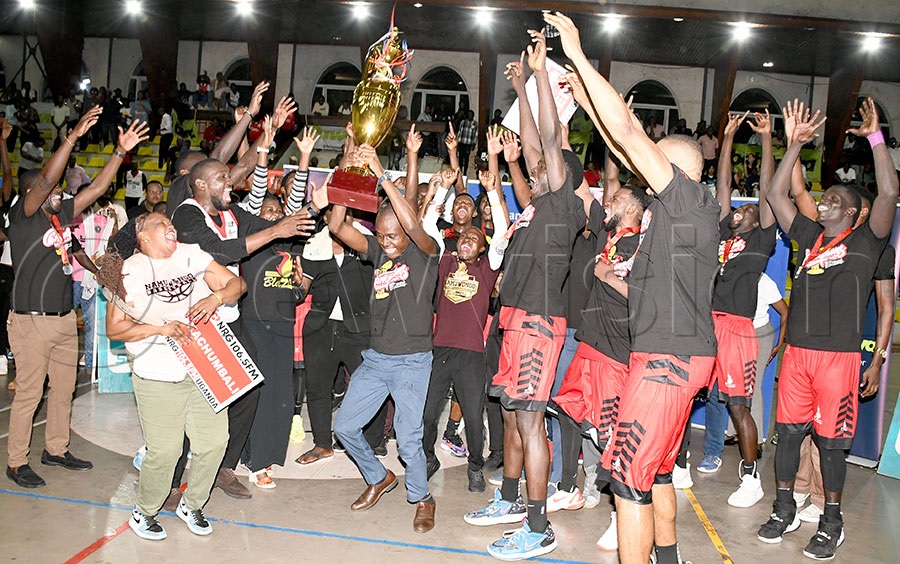 Namuwongo Blazers celebrate with the trophy after Game-6 of the best-of-seven final playoffs at Lugogo, November 5, 2025. Nam Blazers won the series 4-2, after winning Game-6; 68-55. Photo by Michael Nsubuga
