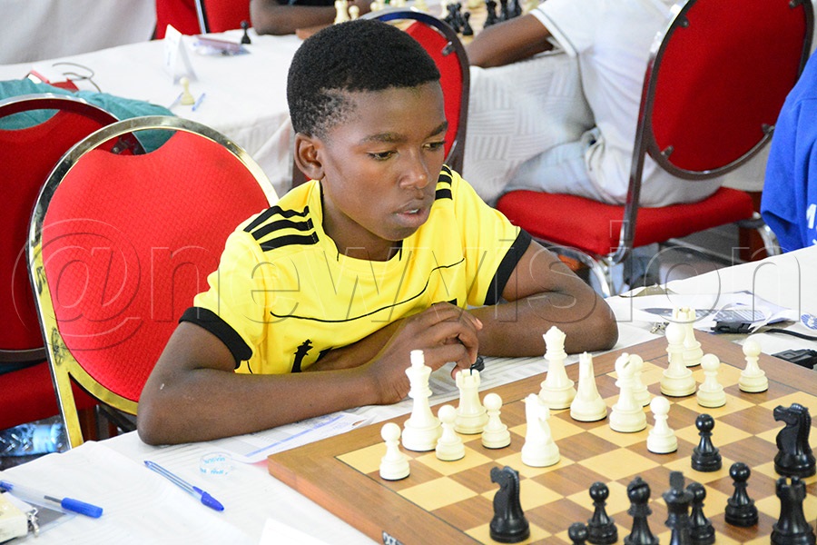 Uganda's Apollo Ahumuza in action in the boys' U-14 category during the Africa Youth Chess Championship at the Imperial Botanical Beach Hotel, May 20, 2026. Photo by Michael Nsubuga