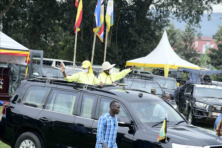 The president and First Lady wave at NRM supporters, upon arrival at Kyamate Primary School playground for the NRM mega rally.