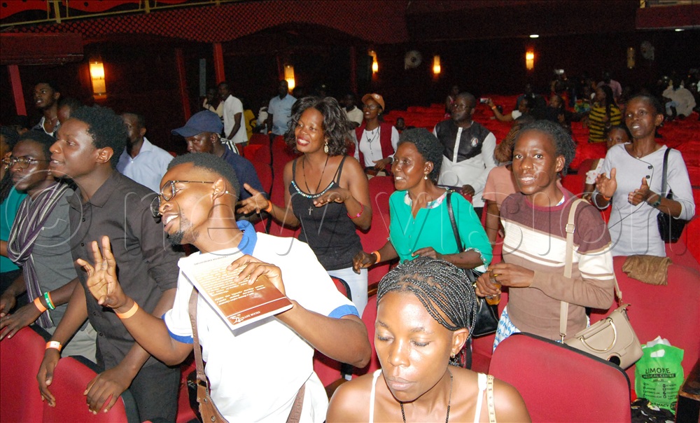 The fans enjoying the show.