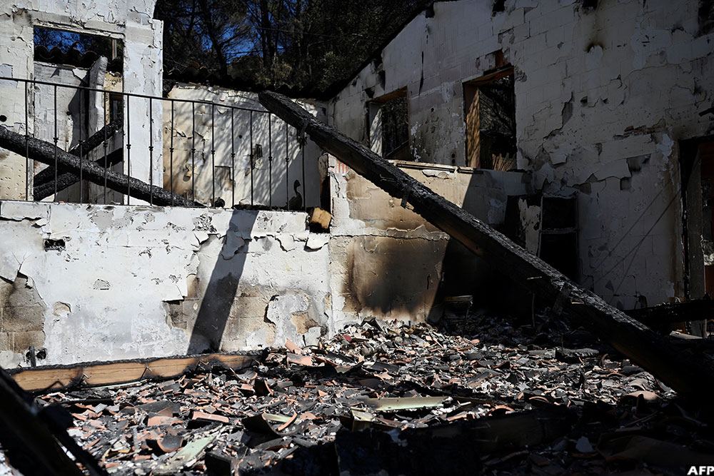 This house, pictured on July 24, 2026, was devastated by a wildfire in Cotignac south-eastern France 