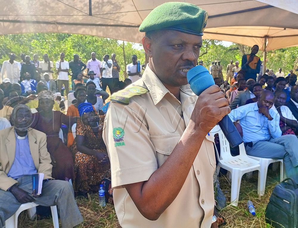 Richard Muhabwe, the Chief warden of KVNP during the burial of the woman killed by an elphant last year in Namokora Sub county, Kitgum district. (Credit: Christopher Nyeko)