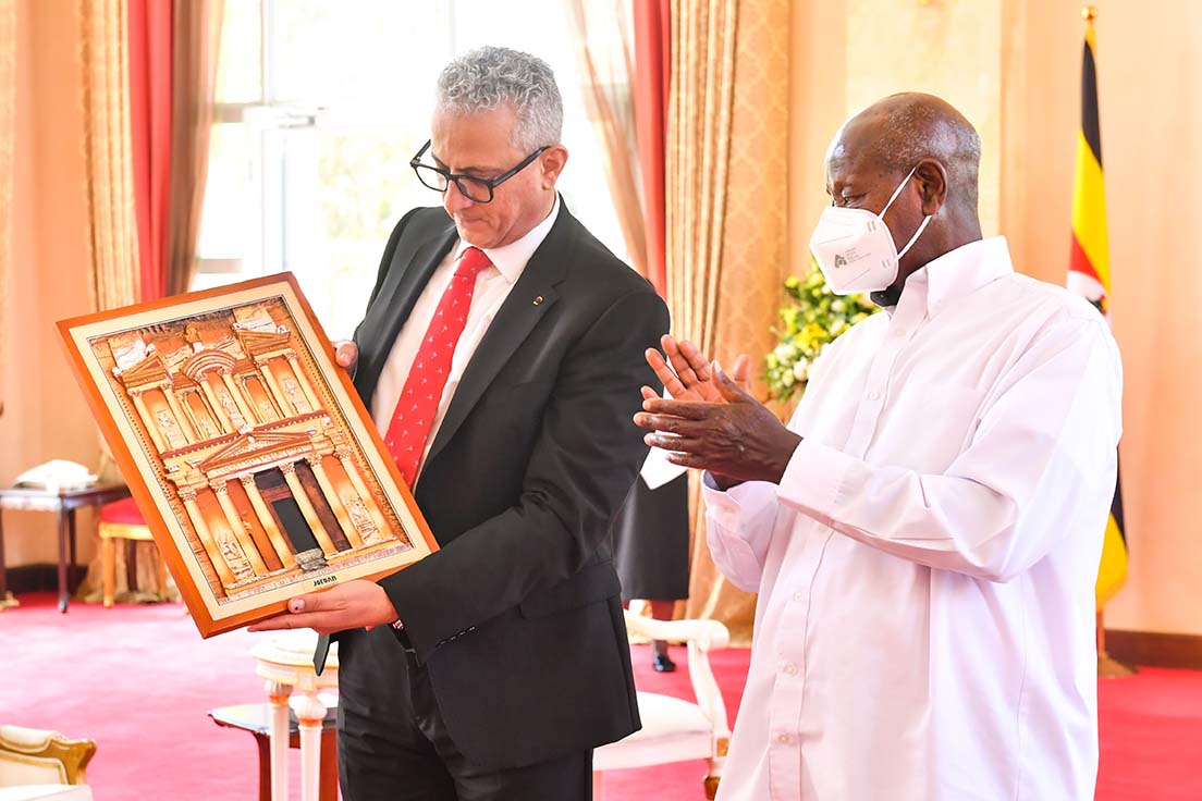 Jordan's New  Ambassador To Uganda Firas Khouri Presents A Gift To President Museveni Shortly After Presenting His Credentials At State House Entebbe On Thursday. Ppu Photo