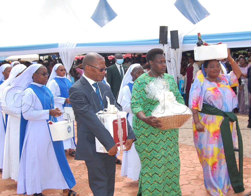 Vice-President Jessica Alupo (centre), Prime minister Robinah Nabbanja (right) and Hon. Dr. John Chrysostom Muyingo (left) during the offertory procession of the thanksgiving mass for the 25th annivesary of Mount Sion Prayer Center, Bukalango at the prayer cenre on Hoima Road, Kakiri Town Council, in Wakiso district on Sunday, April 19, 2026. (Photo by Mathias Mazinga)