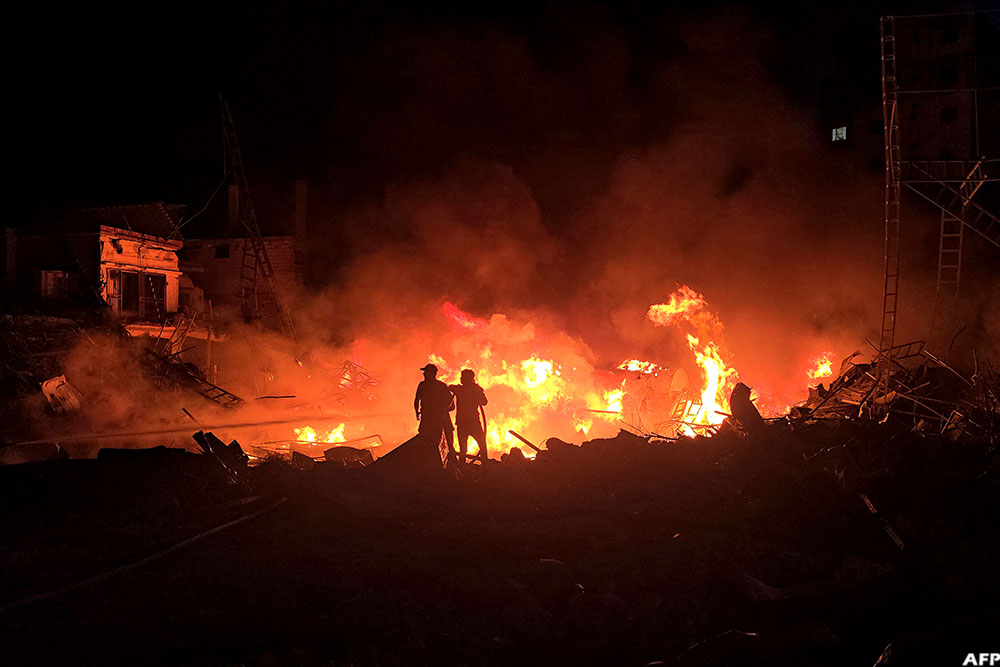  Israel's military had told residents to leave a Beirut suburb, warning it was about to strike targets it said were linked to Hezbollah