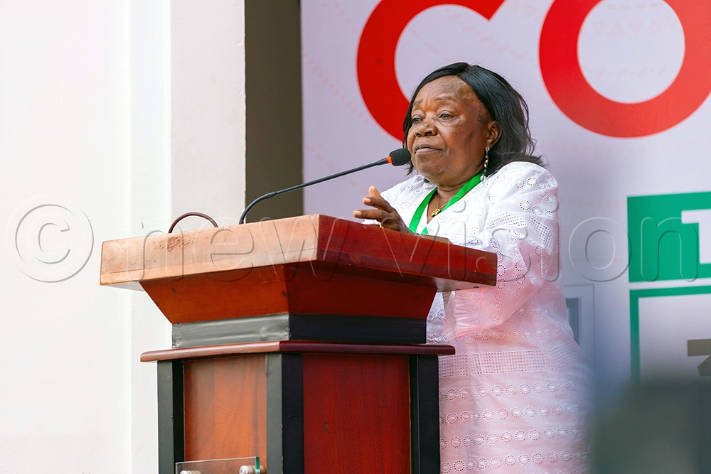 Former minister Loice Biira Bwambale talking to guests, participants and officials from Makerere University during the World Philosophy Day celebrations held at Makerere University Main Hall. (Photo by John Odyek)
