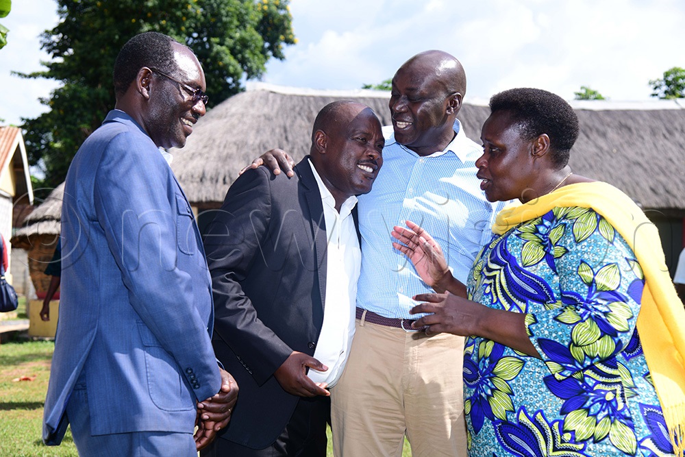 Vice President Jessica Alupo sharing a light moment with some of the Teso MPs Alfred Edakasi from Kaberamido left together with Fred Opolot Pingire who is holding the district chairman Stephen Ochola. (Photo by Godfrey Ojore)