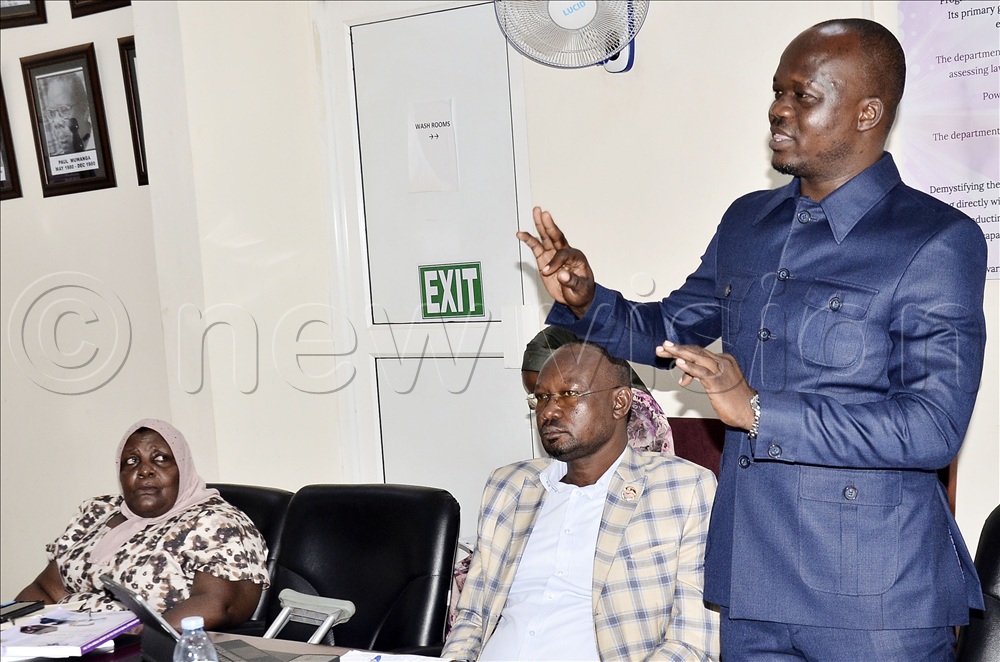 The chairperson of the Equal Opportunities Commission (EOC), Hajjat Safia Nalule Juuko (left) looks on as the member of Parliament for Chekwii East in Nakapiripirit district, Lokoru Stephenson Yoyo (right), speaks during a meeting with the Member of Parliament from Karamoja Region at EOC offices, Kampala, on 10 July 2026. Centre is the MP for Dodoth West and the chairperson of Karamoja Parliamentary Forum, Baatom Ben Koryang. 